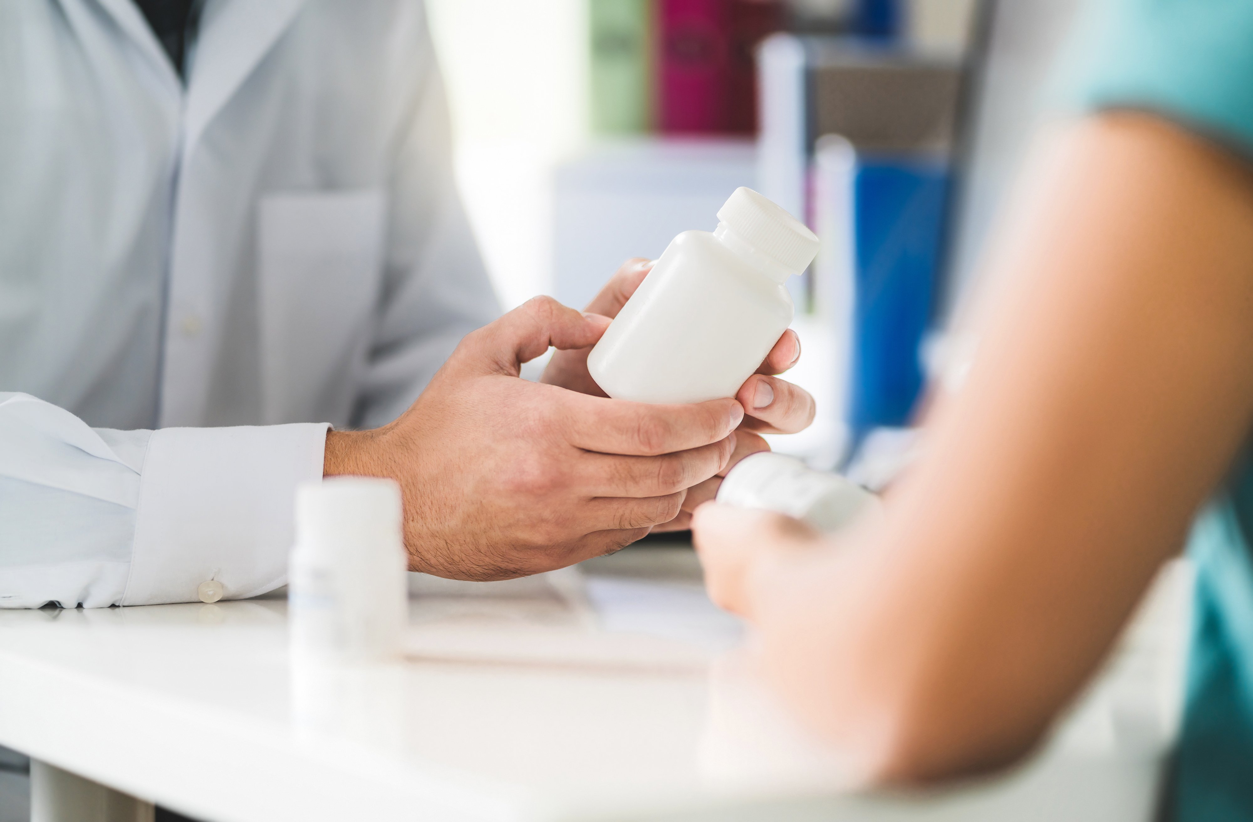 bigstock-Doctor-Consulting-Patient-Abou-267752758